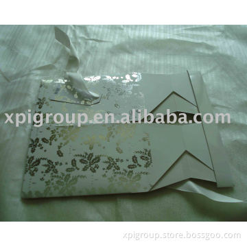 die cut card box with UV coating, silver foil hot stamping and ribbon decoration
